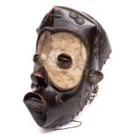 A Bena Lulua ( Democratic Republic of Congo) carved hardwood mask: with protruding forehead, eyes,