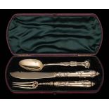 A Victorian silver-gilt three-piece christening set, maker H J Lias & Son, London, 1851: crested,