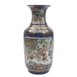 A Chinese famille verte baluster vase: with four moulded edge panels painted with soldiers in