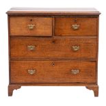 An early 19th Century oak rectangular chest:, the top with a moulded edge,