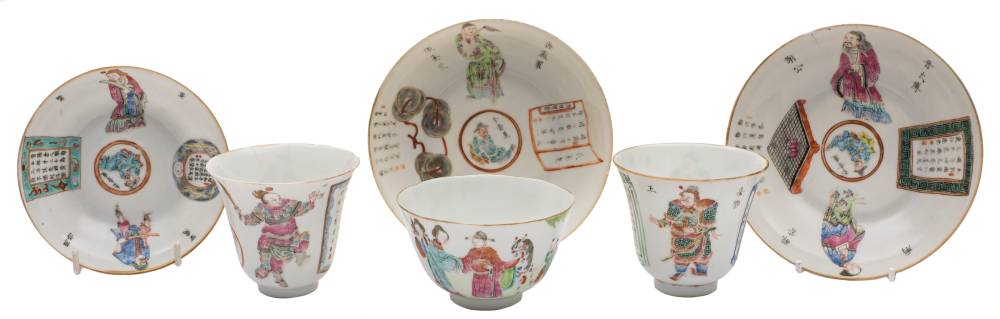 A pair of Chinese famille rose Wu Suang Pu 'Table of the Peerless Heroes' cups and saucers,