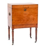 A Regency mahogany and inlaid rectangular cellarette:, bordered with ebony lines,