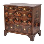 An early 18th Century walnut, banded and floral marquetry rectangular chest:,