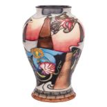 A Moorcroft pottery vase: of baluster form decorated after a design by Emma Bossuns with panels of