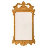 An 18th Century carved giltwood and gesso wall mirror:,