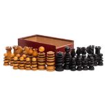 An English St Georges pattern type boxwood and ebonised chess set: both kings missing their finials,