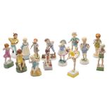A complete set of fourteen Royal Worcester porcelain 'Days Of The Week' figures of boys and girls: