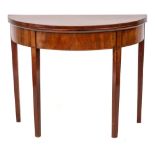 An early 19th Century mahogany and inlaid half round tea table: with a hinged top and boxwood