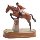 A Royal Worcester Limited Edition equestrian figure of 'Foxhunter and Lt. Col. H.M.Llewellyn C.B.E.