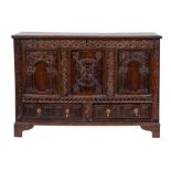 An early 18th Century carved oak rectangular dower chest:,