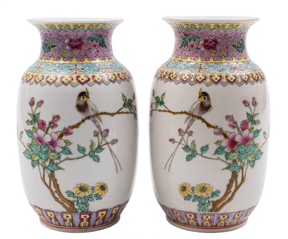 A pair of Chinese famille rose vases: each painted with an inscription and a long tailed bird