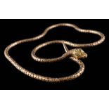 A 'snake' necklace with emerald-set eyes: stamped '9ct gold', approximately 44cm overall length, 9.