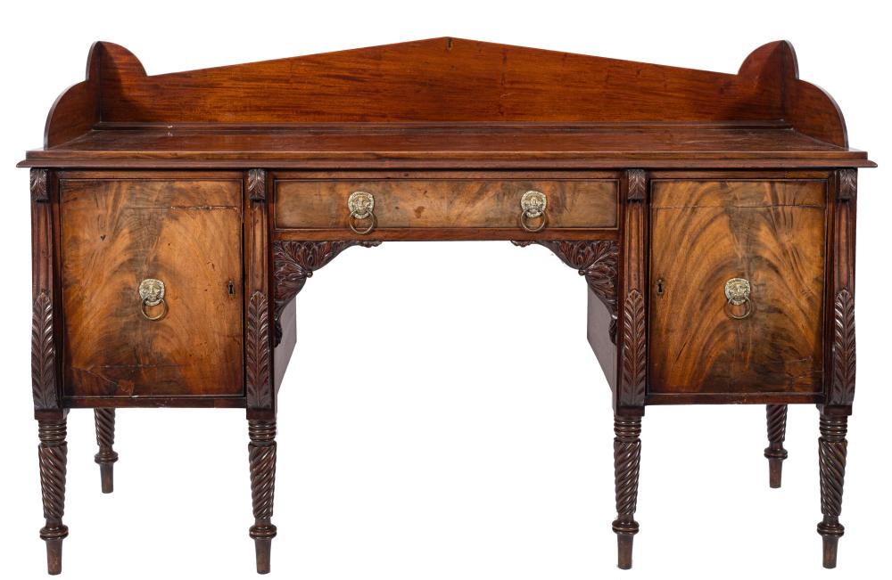 A Regency Scottish carved mahogany sideboard:, with an angled arch three quarter ledge back, - Image 2 of 3