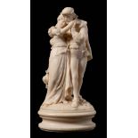 A 19th century Continental carved ivory group: Romeo and Juliet, mounted on an oval socle base,