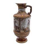 A large Mettlach stoneware ewer, signed 'Warth': with oak branch handle, moulded,