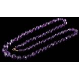 A graduated faceted amethyst bead,