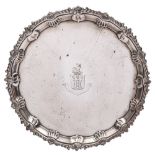 An Edward VII silver salver, maker Josiah Williams & Co, London, 1901: crested, of circular outline,