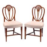 A pair of George III elm dining chairs:,