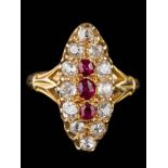 A ruby and diamond marquise-shaped cluster ring: centring three oval rubies within a surround of