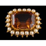 A citrine and split pearl mounted rectangular brooch: the rectangular citrine approximately 20mm