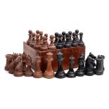 A Staunton pattern competition weighted chess set: one side ebonised the other in boxwood,