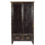A Chinese black lacquer and gilt decorated side cupboard:, with foliate and geometric decoration,