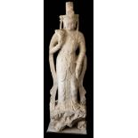 A large Chinese micaceous marble statue of Guanyin: in the Tang style,