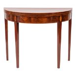 A George III mahogany and inlaid half round tea table: bordered with boxwood lines,