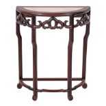 A Chinese Hua Li wood half-round hall table table: the top inset with a panel of white marble,