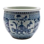 A Chinese blue and white jardiniere: painted with panels of auspicious objects on a prunus ground