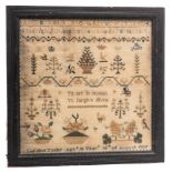 An early Victorian needlework sampler: with banded decoration of an upper and lower case alphabet,