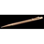 Sampson Mordan & Co. A 9ct gold propelling pencil: stamped 'R.C.