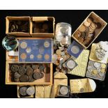 A collection of tins and boxes containing world and English coins including some pre-1947 silver.