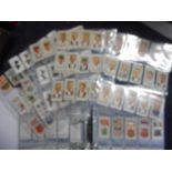 Players sets of cigarette cards: Butterflies 50/50, Household Hints 50/50,