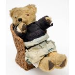 A 20th century blonde plush Teddy bear: with glass eyes,