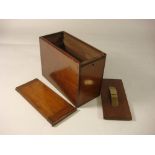 A late 19th century mahogany stereoscope slide box: with brass sprung retaining cover under sliding