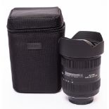 A Sigma 512-24mm f4.5-5.6 II DG lens in original box and bag.