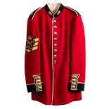 A Grenadier Guards Sergeants tunic: of large size, chest 42 inches, waist 35 1/2 inches.