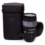A Sigma 150mm f.2.8 APO macro DG lens in original box and bag.