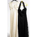 A black silk and lace halter neck evening dress by Peter Robinson: together with a white silk