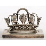 An Edwardian silver Royal Naval Crown place holder, London 1905: maker indistinctly struck mark,