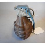 A British army practice grenade:12cm high.