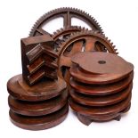 A group of six foundry wooden templates,: comprising of three cog gears,
