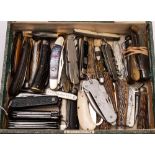 A collection of various knives and penknives including a WWII issue Royal Navy Clasp knife,
