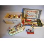 J Wagner, Nurnberger, a post war clockwork tinplate toy: of two wood cutters cutting a log,