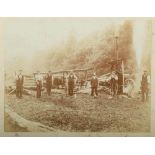 Four late 19th/early 20th century framed photographs: one of a town fete, one of a cattle market,