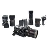 A Hassellblad 500CM square/medium format camera serial number RU1405742: together with four backs,