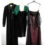 A group of seven various black evening dresses: (no maker's labels)