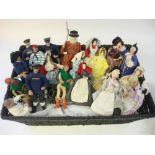 A group of twenty Cornish Shallowpool dolls,: including Fishermen, Town Crier, Beefeater and others,