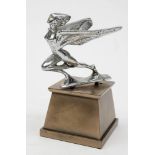 An early 20th century Humber Goddess car mascot: nickel plated and mounted on a later resin plinth,